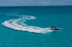 2021-Sundancer-370-Outboard-DAO370-aerial-running-starboard-07825