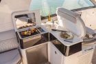 2021-Sundancer-370-Outboard-DAO370-cockpit-wet-bar-grill-refrigerator-05342