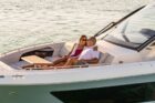 2021-Sundancer-370-Outboard-DAO370-lifestyle-bow-couple-table-05859